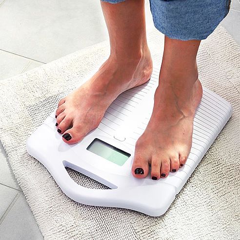 Woman on a set of scales